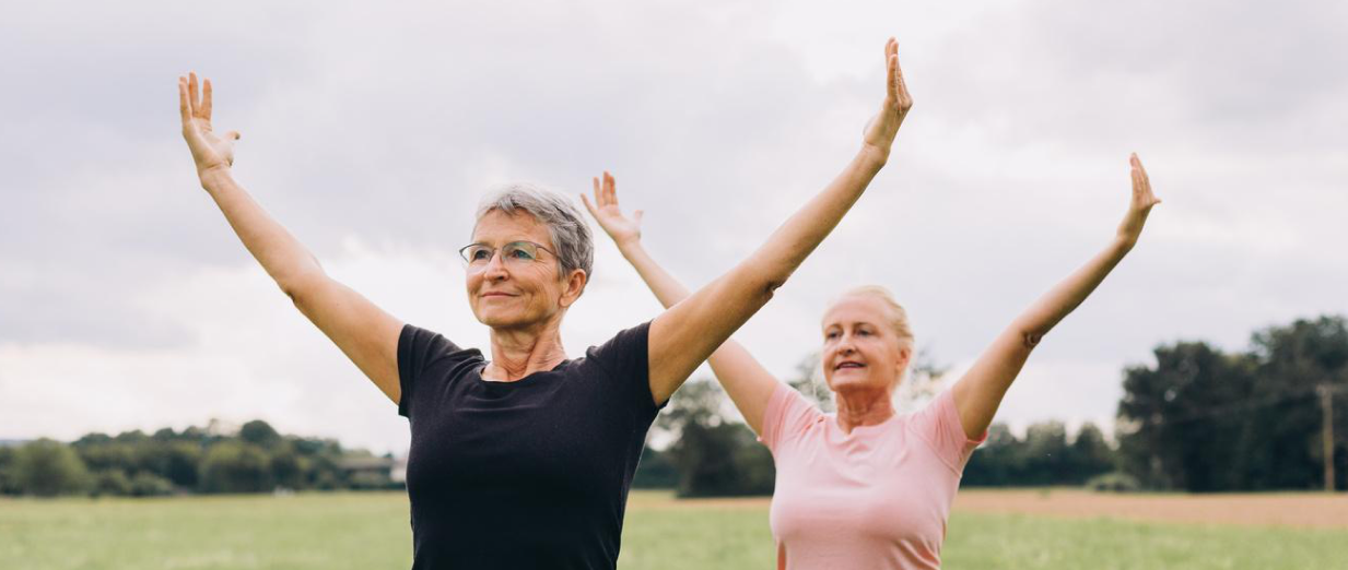 Arms raised in Tai Chi form